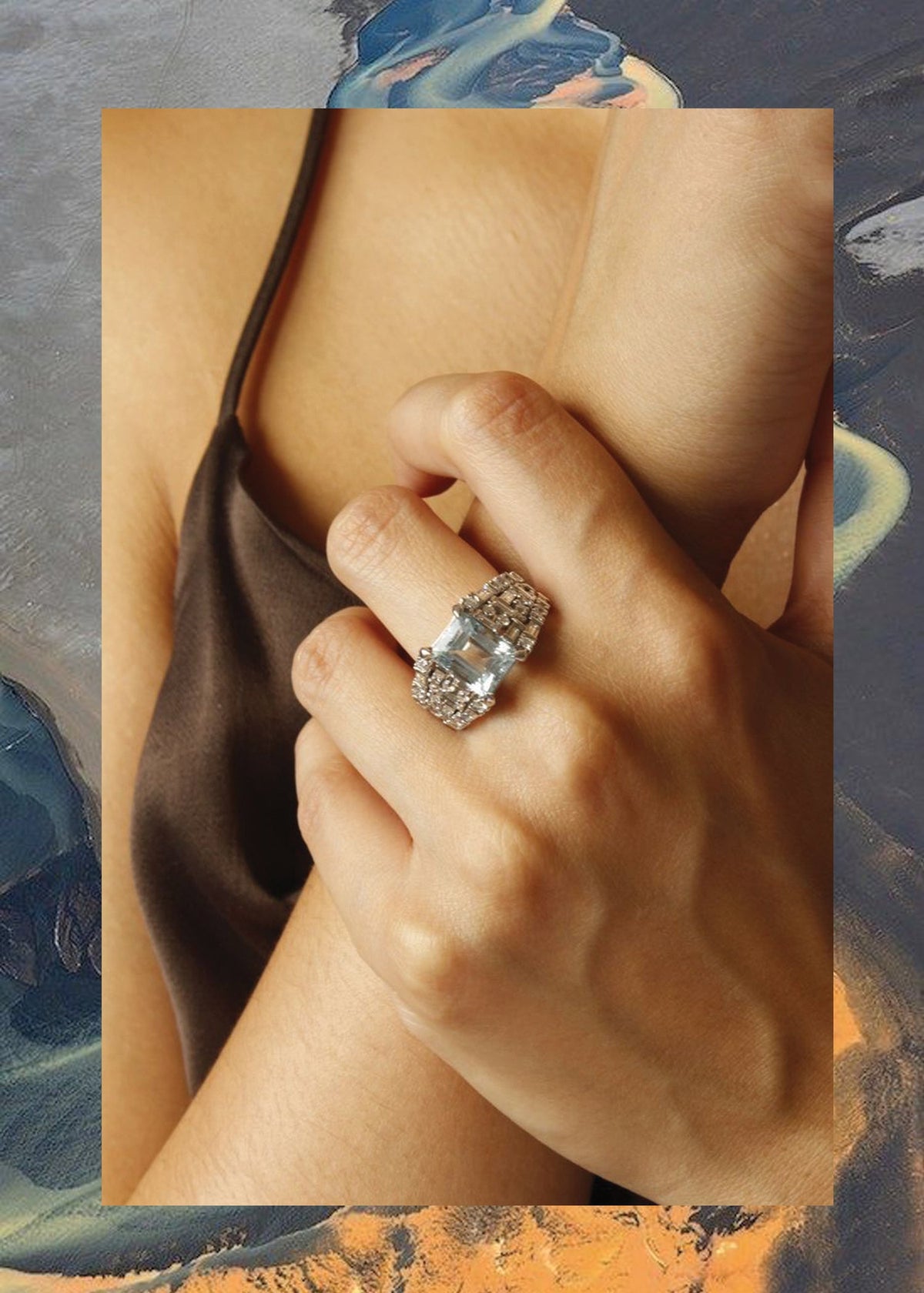 Aquamarine ring worn on hand
