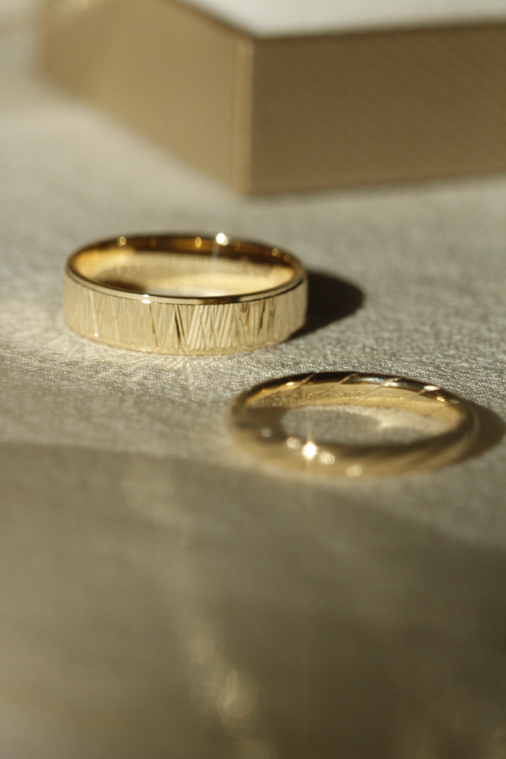 His and Her Wedding Bands in Yellow Gold with Gold Ribbon