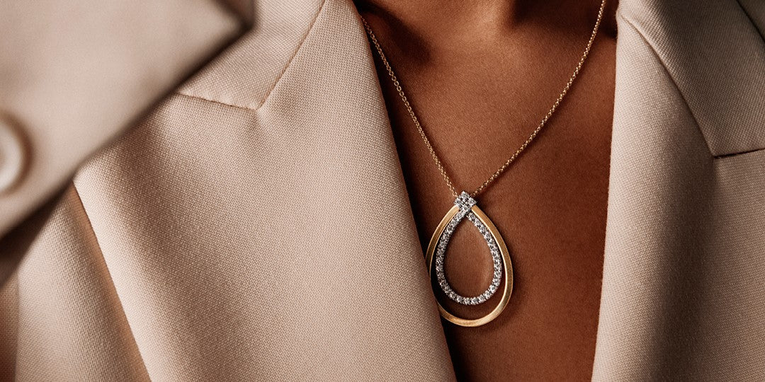 Women wearing Marco Bicego diamond necklace