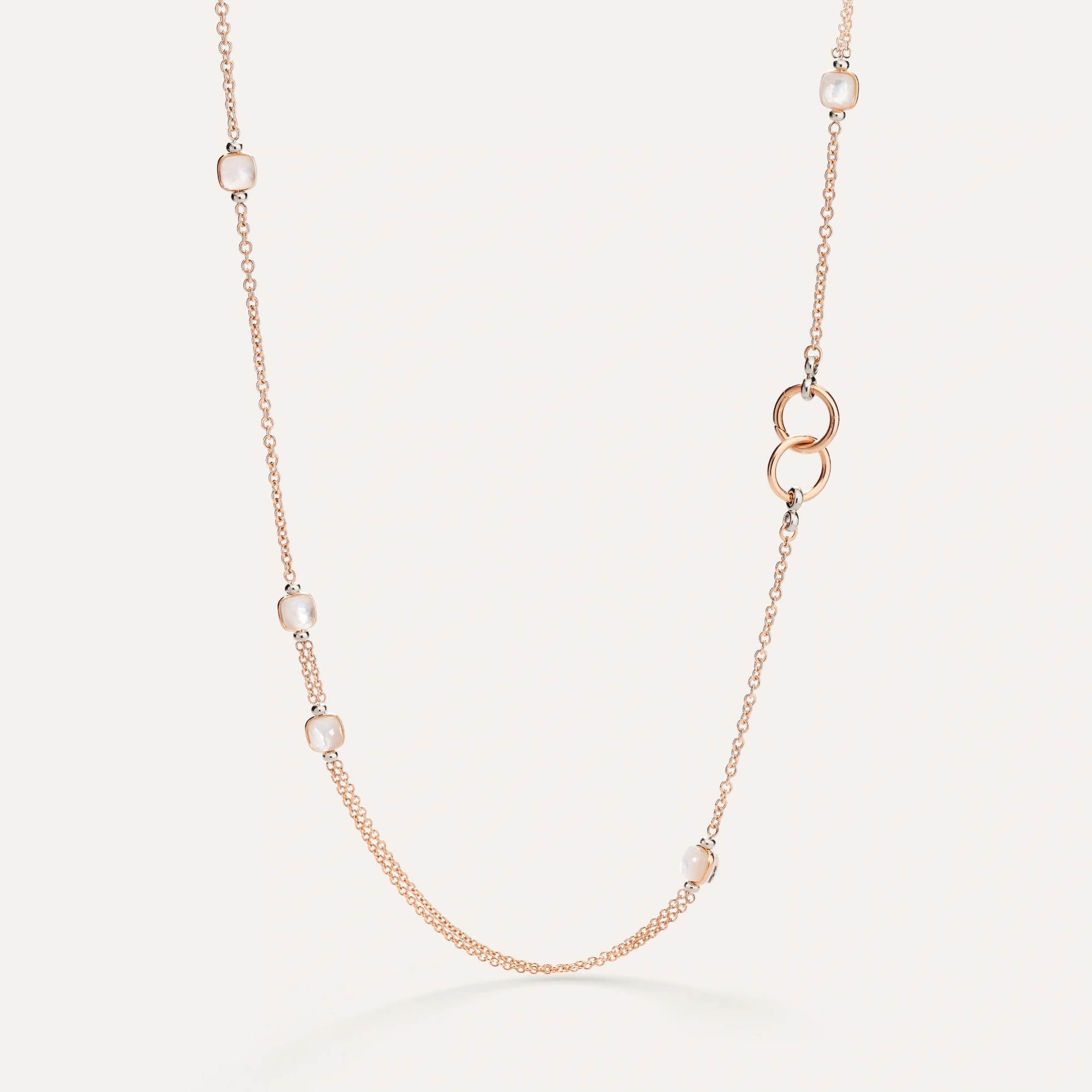 Long nudo neckalce in 18k rose and white gold with mother of pearl and white topaz