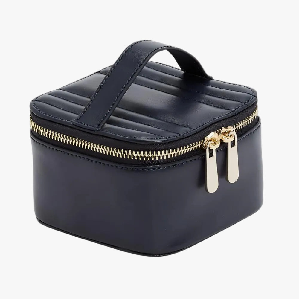 Discover the WOLF Maria Zip Jewellery Cube in navy leather with LusterLoc™ anti-tarnish lining and elegant travel jewellery storage. Available at Orsini Auckland.