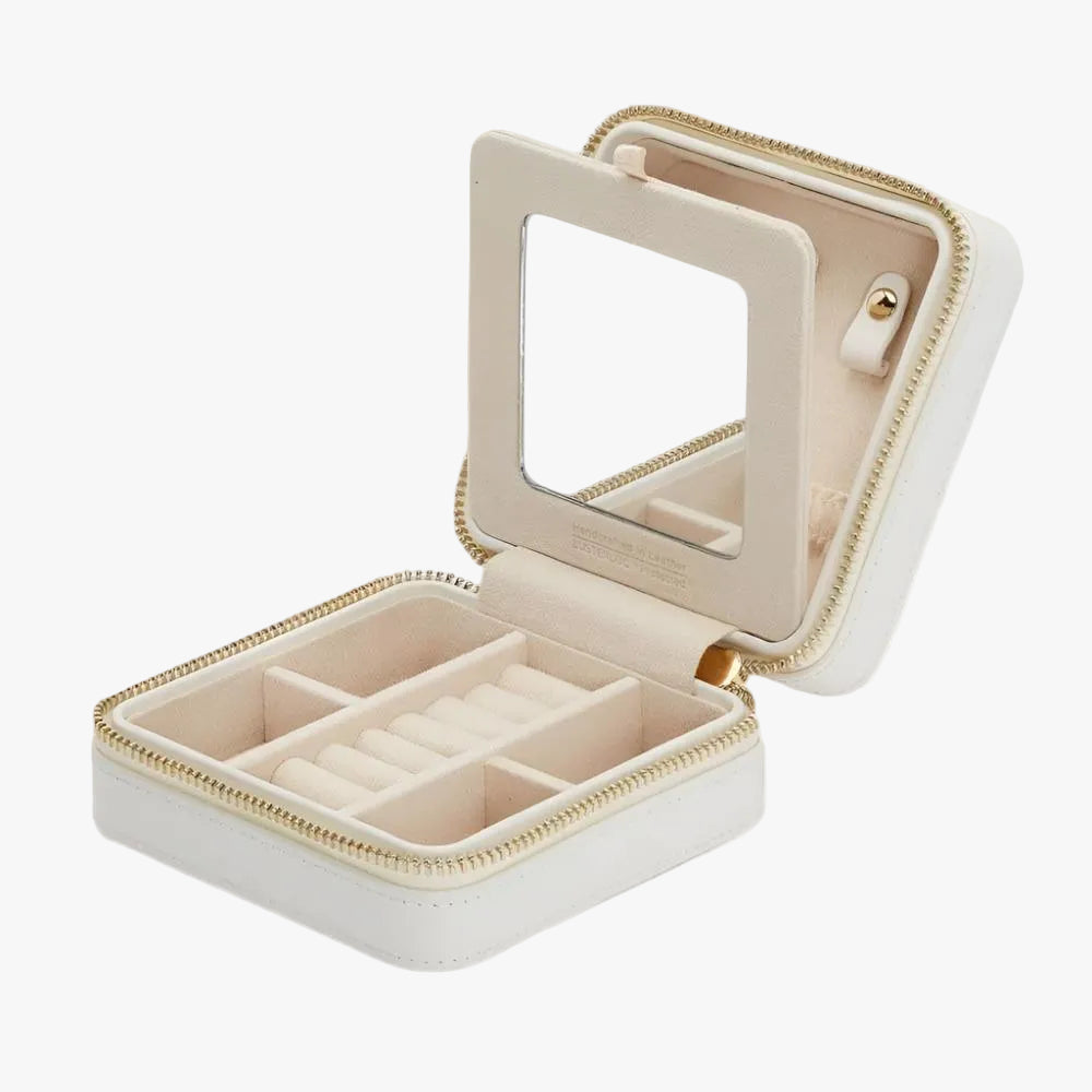 Discover the WOLF Maria Small Zip Jewellery Travel Case in white leather with LusterLoc™ anti-tarnish lining and elegant travel storage. Available at Orsini Auckland.