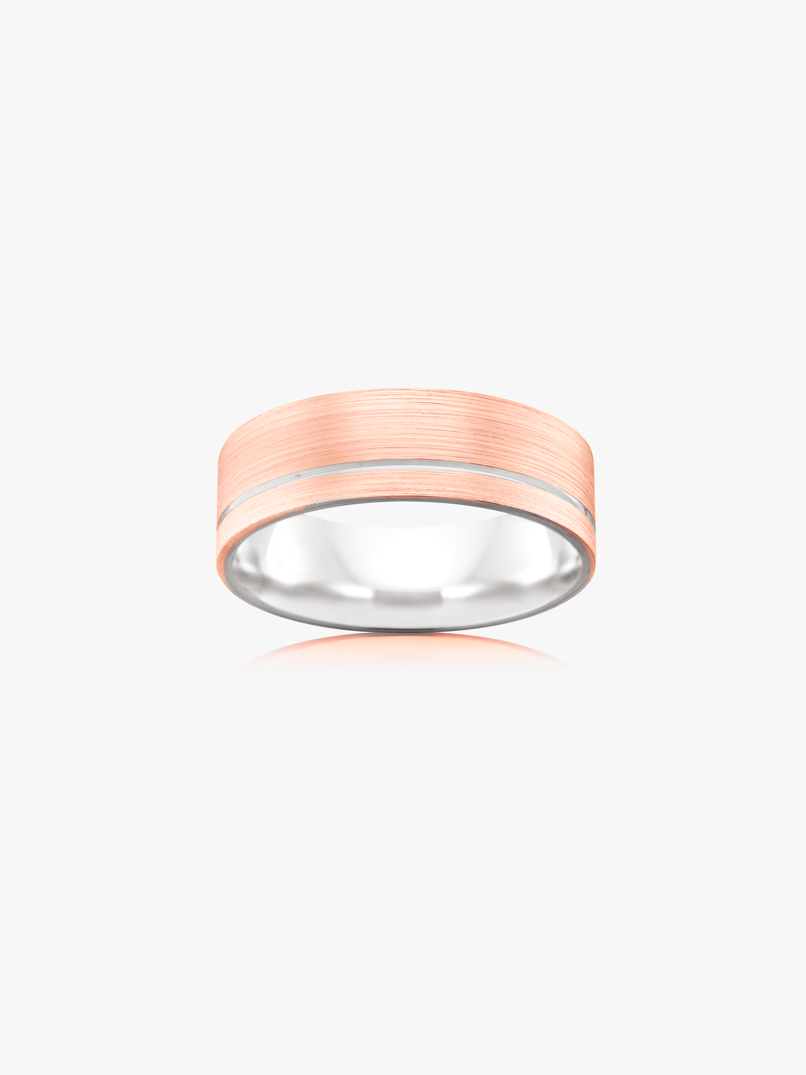 This men’s wedding ring is crafted in 18kt rose and white gold, offering a refined contrast of warm and cool tones. Designed with clean lines, it reflects enduring elegance and modern European craftsmanship.