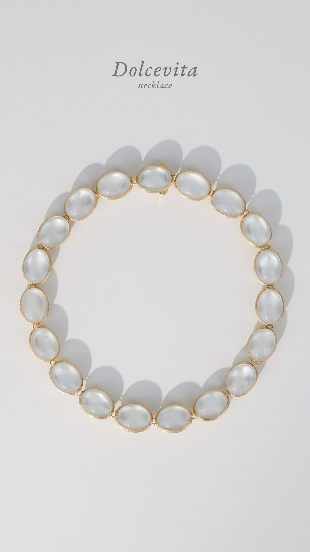 pearl necklace from Nanis set in 18k yellow handetched gold