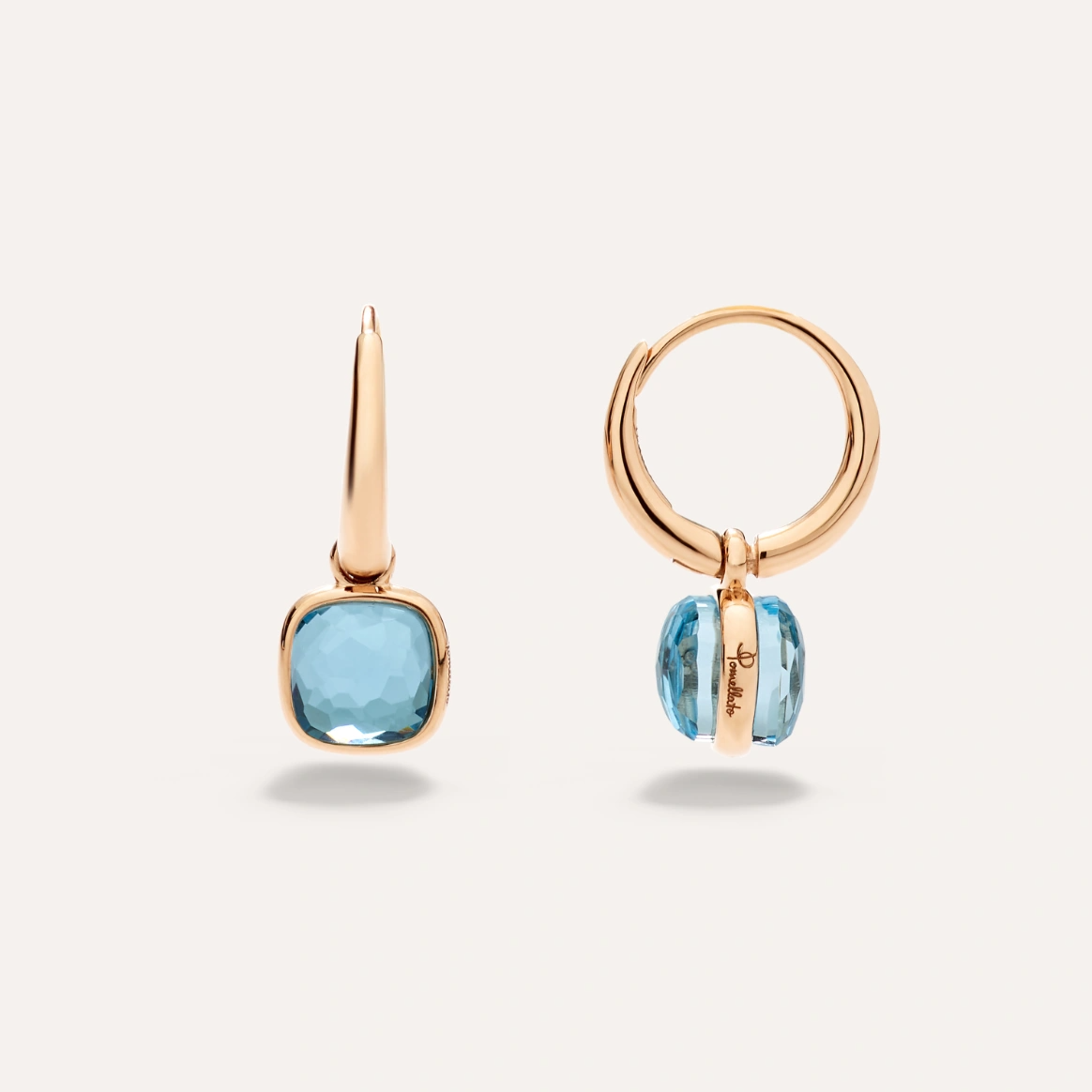 Nudo Mini Earrings
Sky blue topaz gemstones
