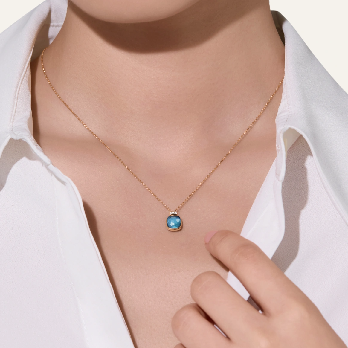 Pomellato Nudo Mini Necklace with London Blue Topaz and Diamonds PCC5020O6WHRDB0TL on model
