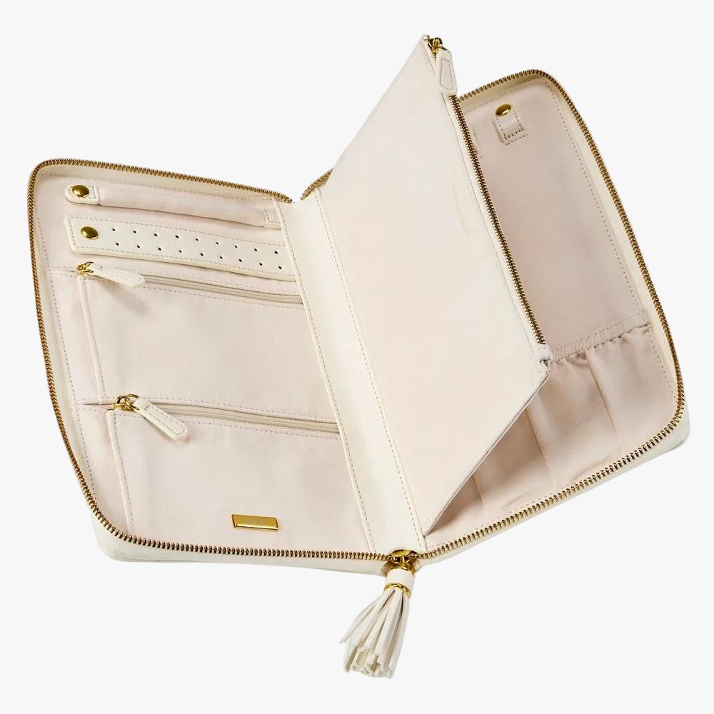 WOLF Lauren jewellery portfolio in ivory leather with elegant storage for rings, earrings and necklaces. Discover luxury jewellery travel accessories at Orsini.