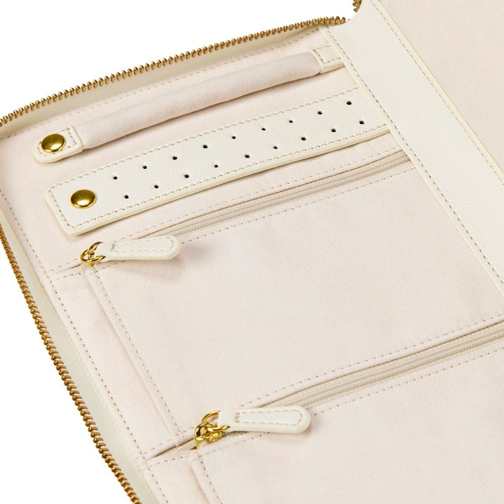 WOLF Lauren jewellery portfolio in ivory leather with elegant storage for rings, earrings and necklaces. Discover luxury jewellery travel accessories at Orsini.