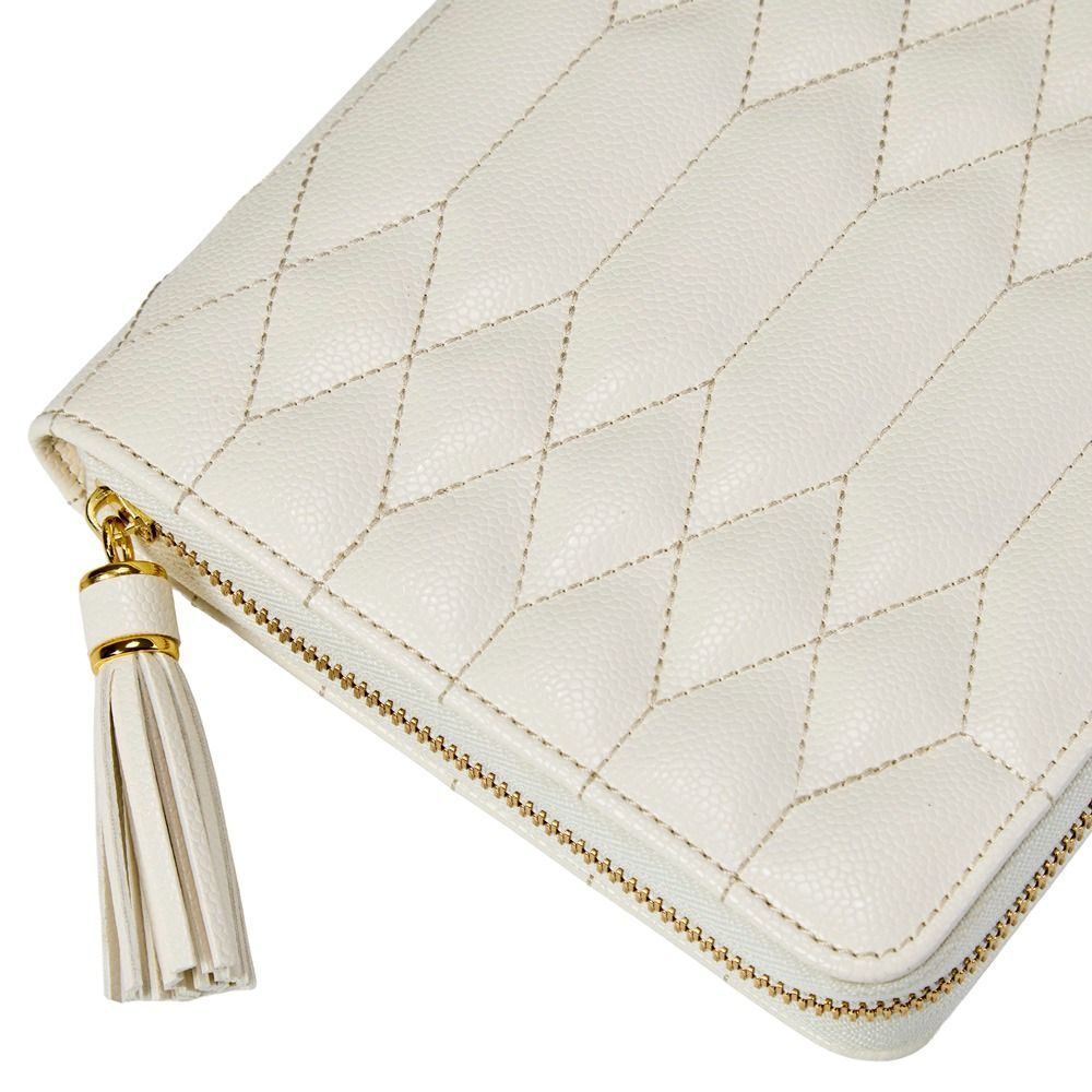 WOLF Lauren jewellery portfolio in ivory leather with elegant storage for rings, earrings and necklaces. Discover luxury jewellery travel accessories at Orsini.