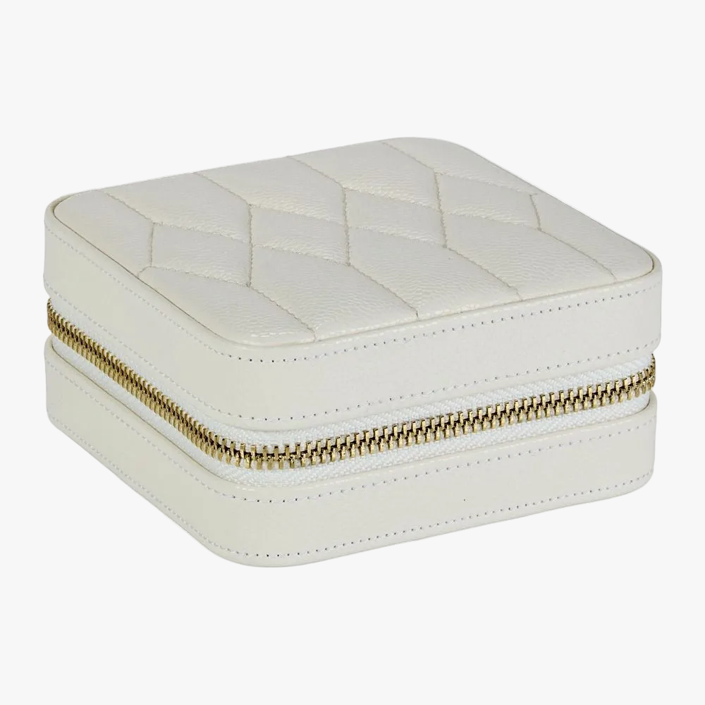 A travel essential, the Lauren Zip Case keeps jewellery secure and tangle-free. Lightweight, structured and lined with LusterLoc™, it’s designed for effortless organisation on the go.
