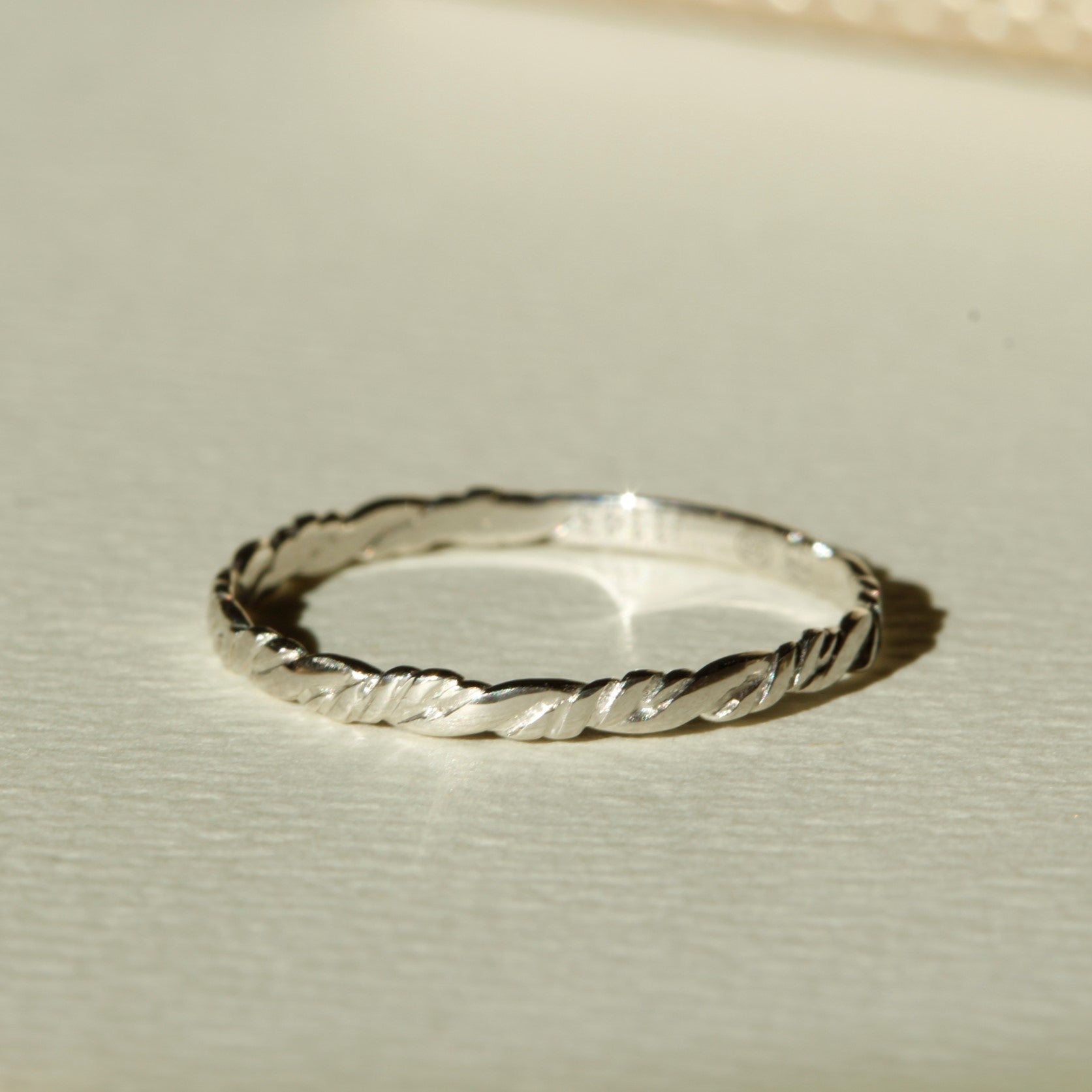 Womens Wedding Ring in 18k White Gold or Platinum with a twisted pattern or filigrie