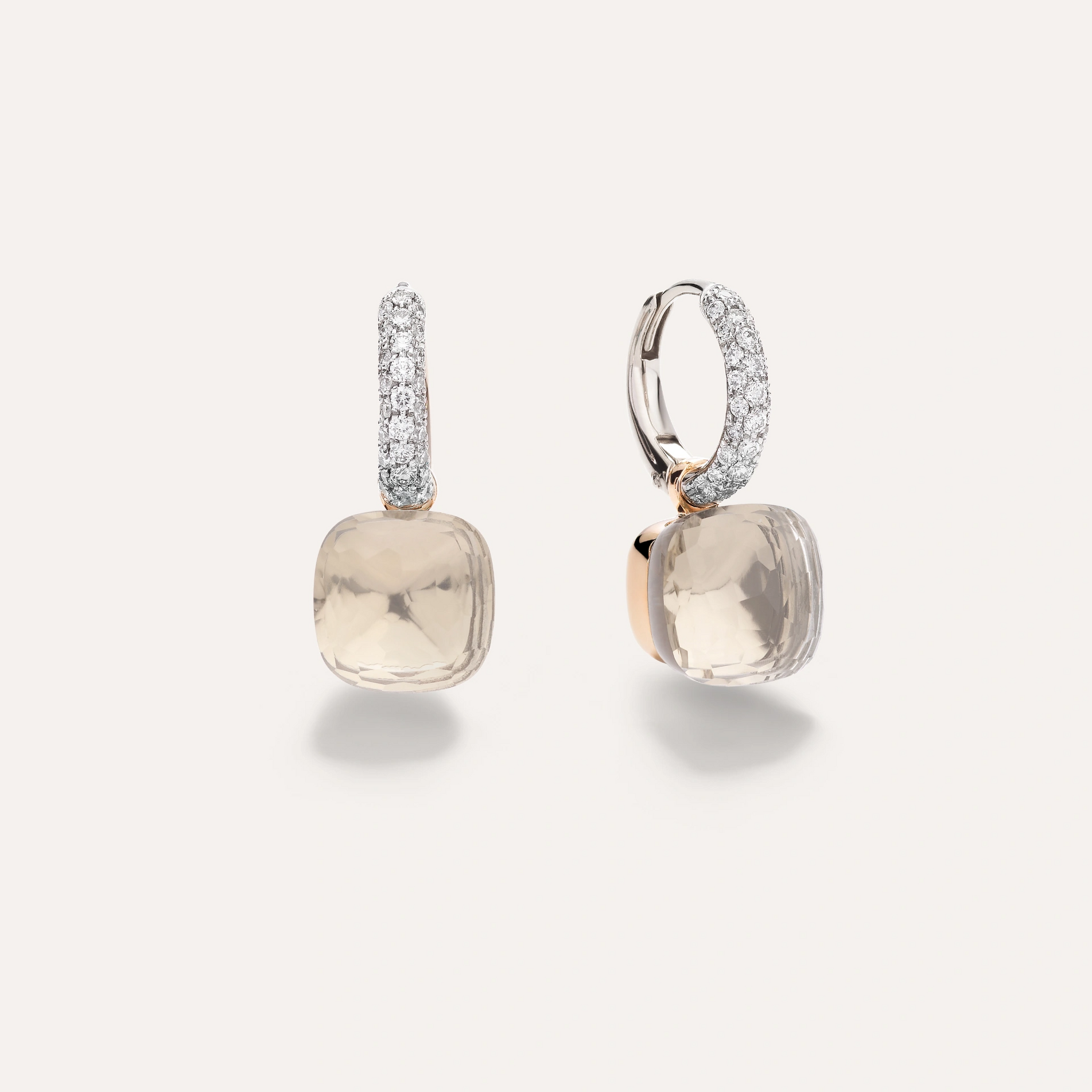 White topaz and diamond drop earring from the pomellato nudo collection set in rose and white gold