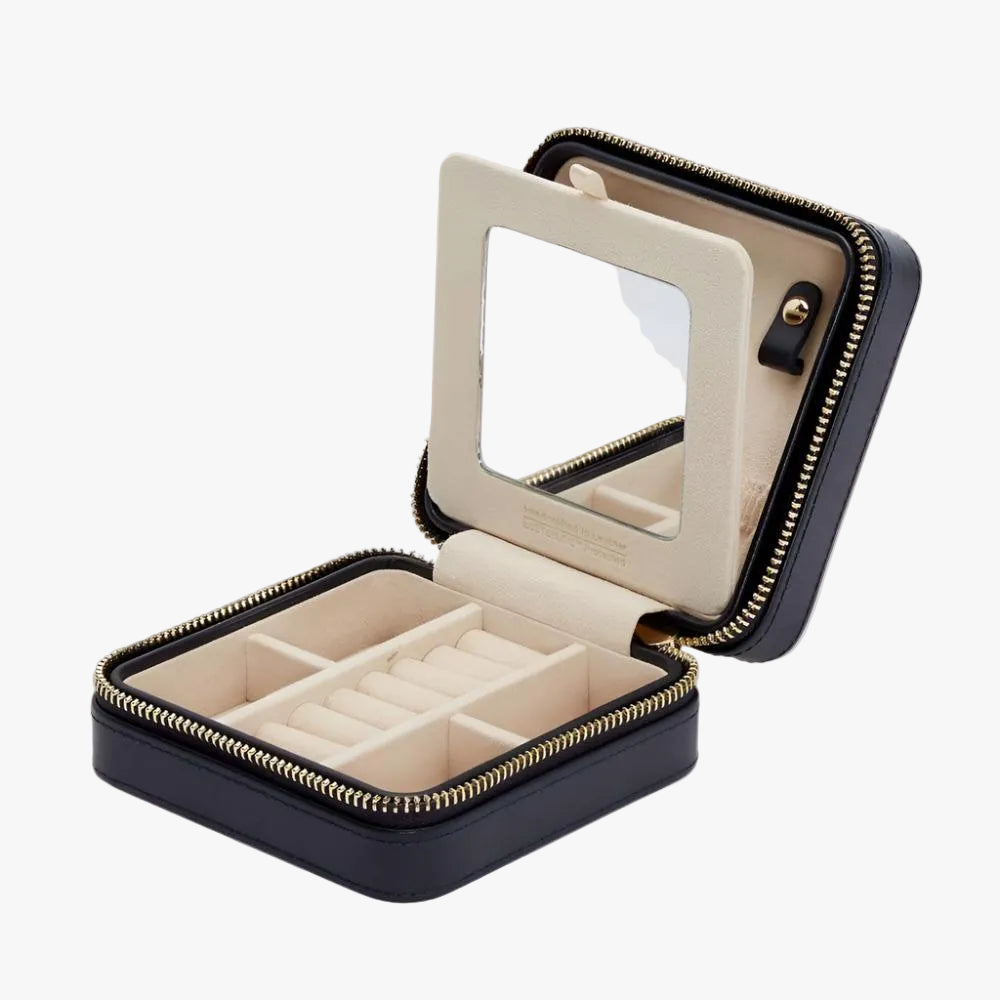 Maria Navy Small Zip Jewellery Travel Case by Wolf
Curated by Orsini Fine Jewellery in Auckland, this elegant travel jewellery case reflects WOLF's heritage of exceptional craftsmanship, combining luxurious materials with intelligent design for those who appreciate beautifully organised jewellery at home and away.