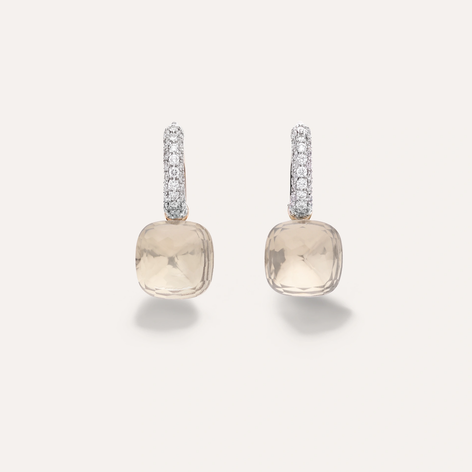 White topaz and diamond drop earring from the pomellato nudo collection set in rose and white gold