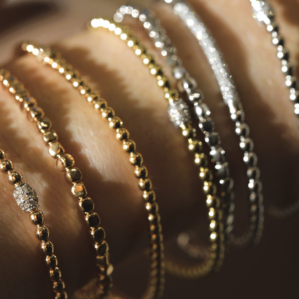 beautiful 18k gold stretch bracelets at orsini