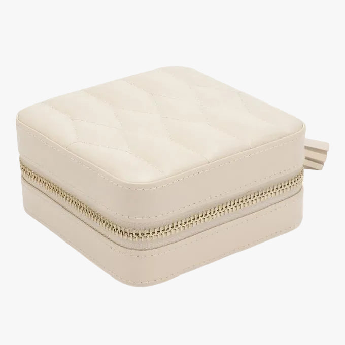 Discover the WOLF Caroline Travel Jewellery Case in ivory quilted leather with LusterLoc™ anti-tarnish lining. Available at Orsini Auckland.
