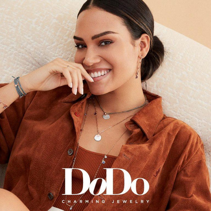 Model wearing Dodo jewellery
