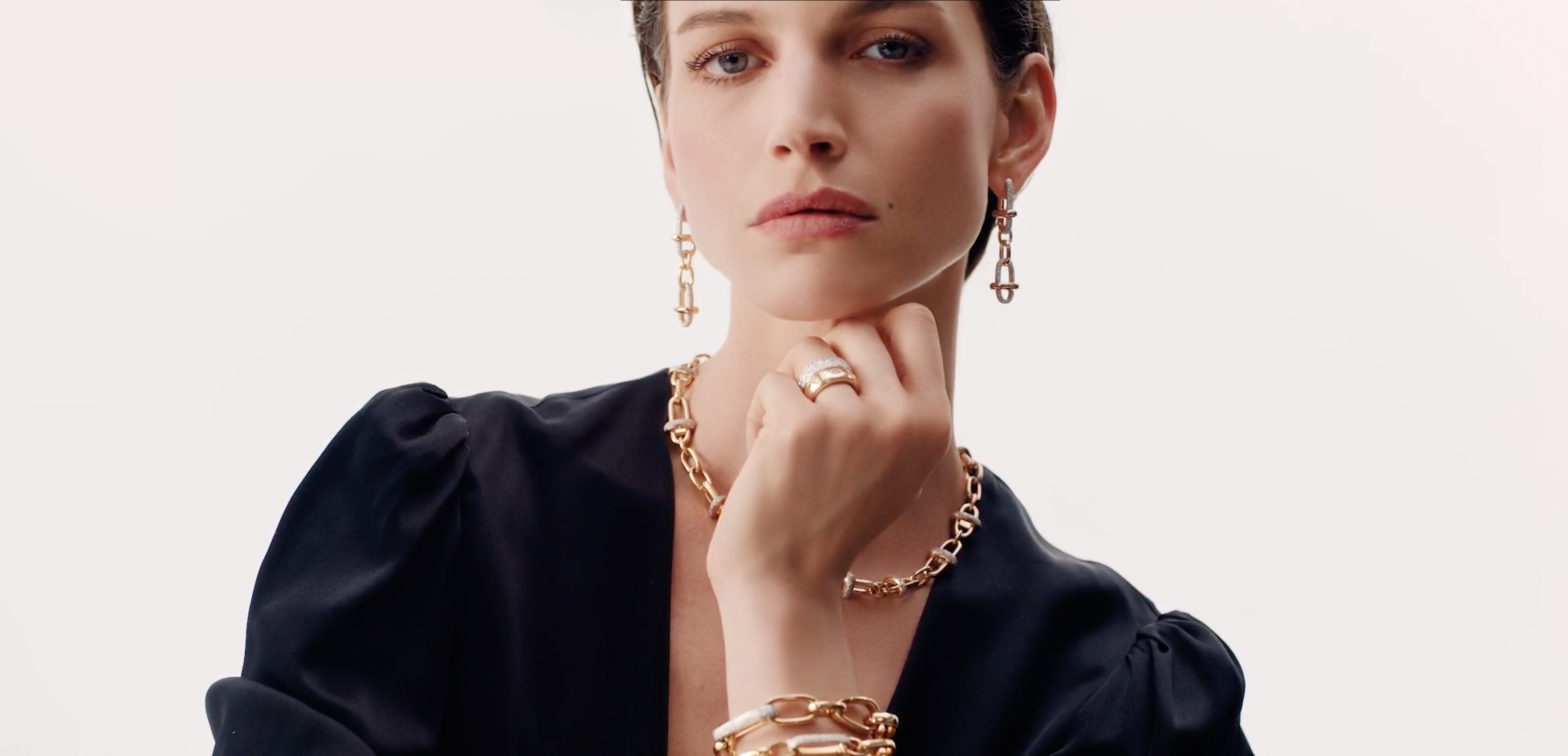 Woman wearing gold and diamond bracelet