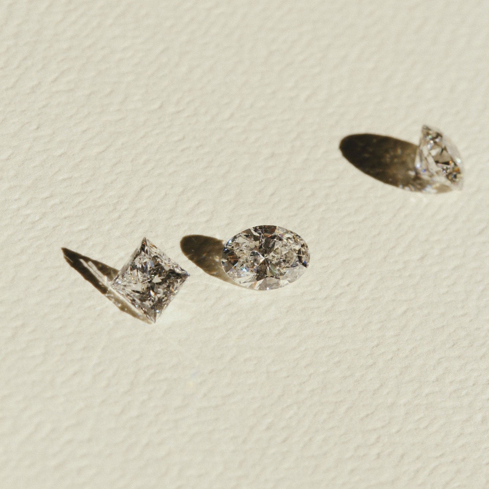 Unset Oval Diamond, Round Diamonds and Princess Diamond