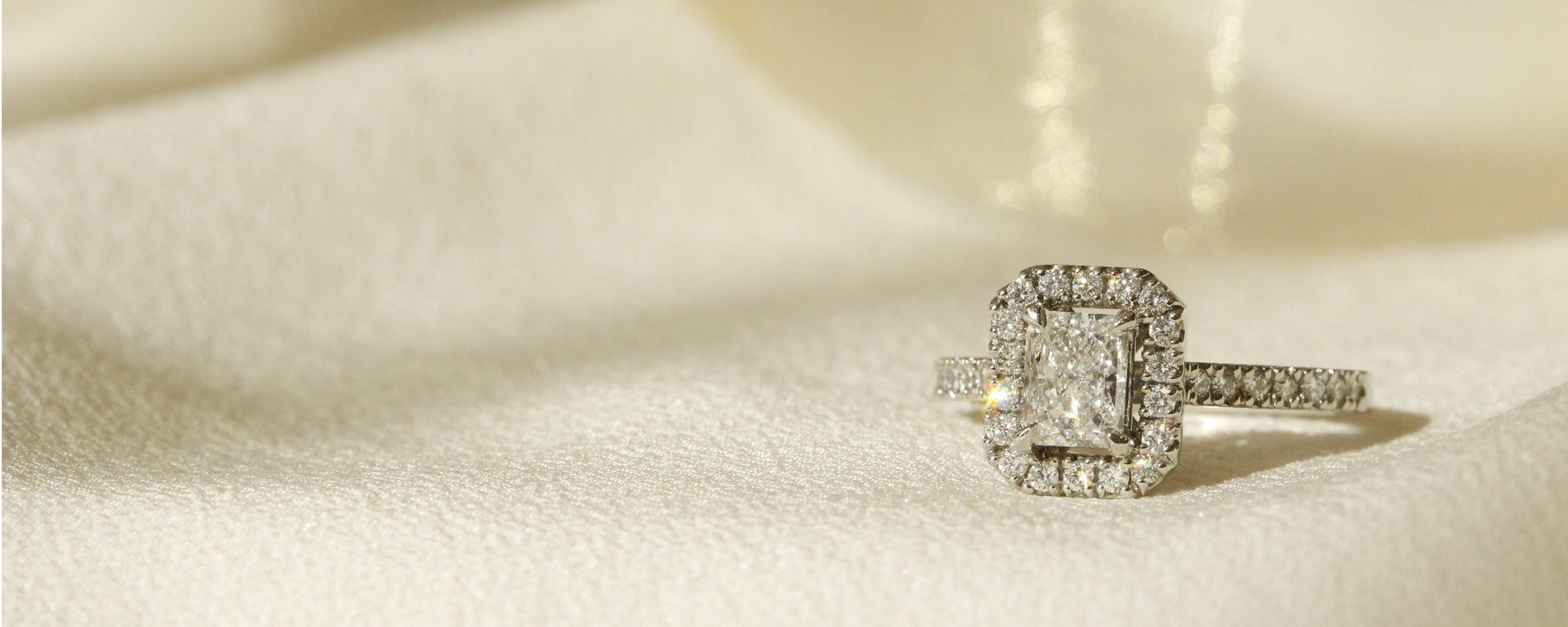 Radiant Diamond with diamond halo engagement ring Le Fenice Radiant setting by Orsini Fine Jewellery setting horizontal image 