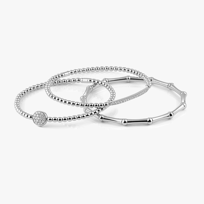 Al Coro Bamboo Stretchy Bracelets in 18k White Gold with diamonds group of three bamboo