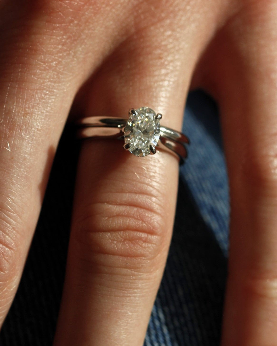Classico Oval Solitaire Diamond Engagement Ring in white gold on model