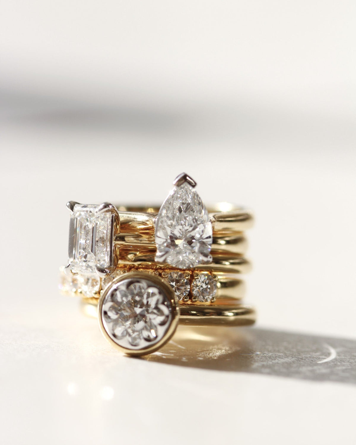 stack of diamond engagement rings