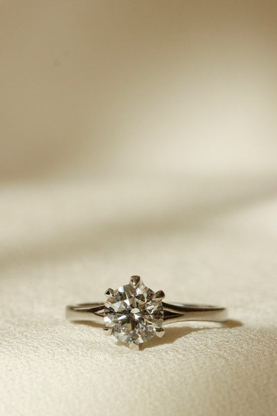 6 claw diamond centre stone on white gold band classic style engagement ring Ducale setting vertical image 