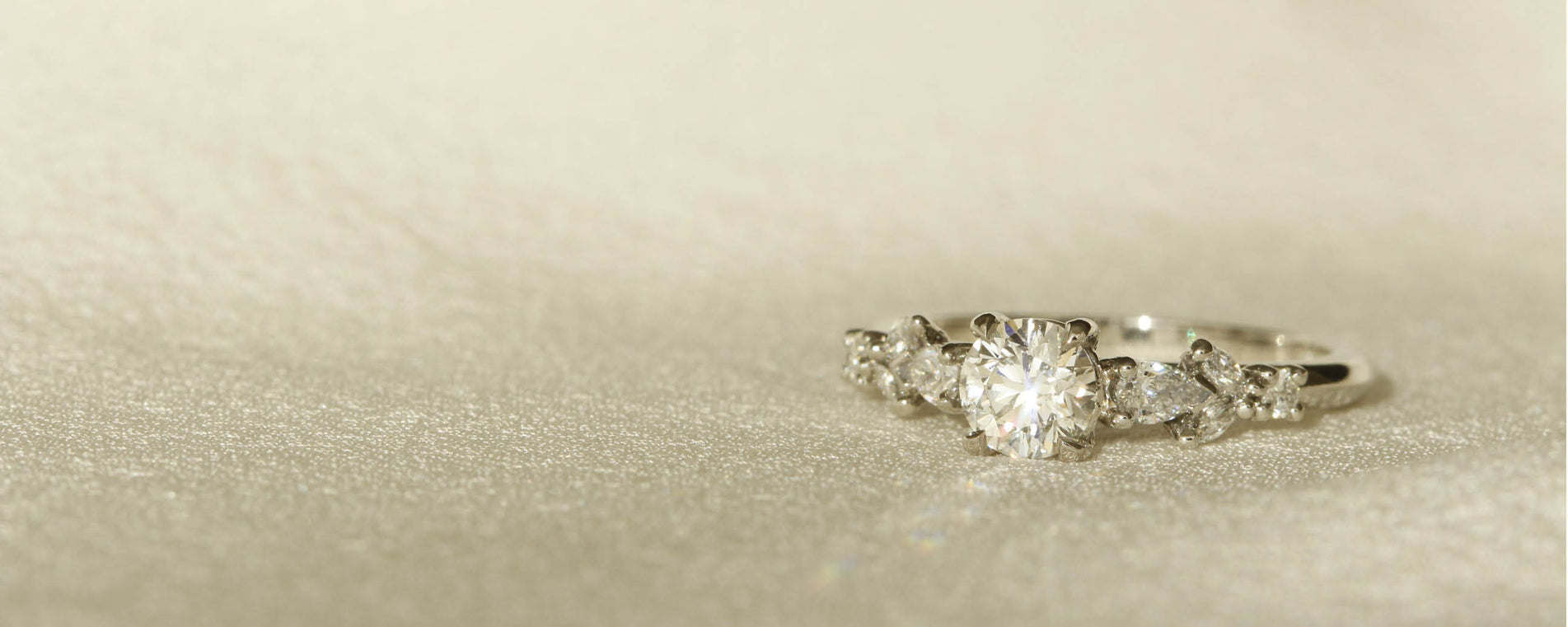 Orsini Nesso Engagement Ring Design with brilliant round diamonds, pear diamonds, marquise diamonds