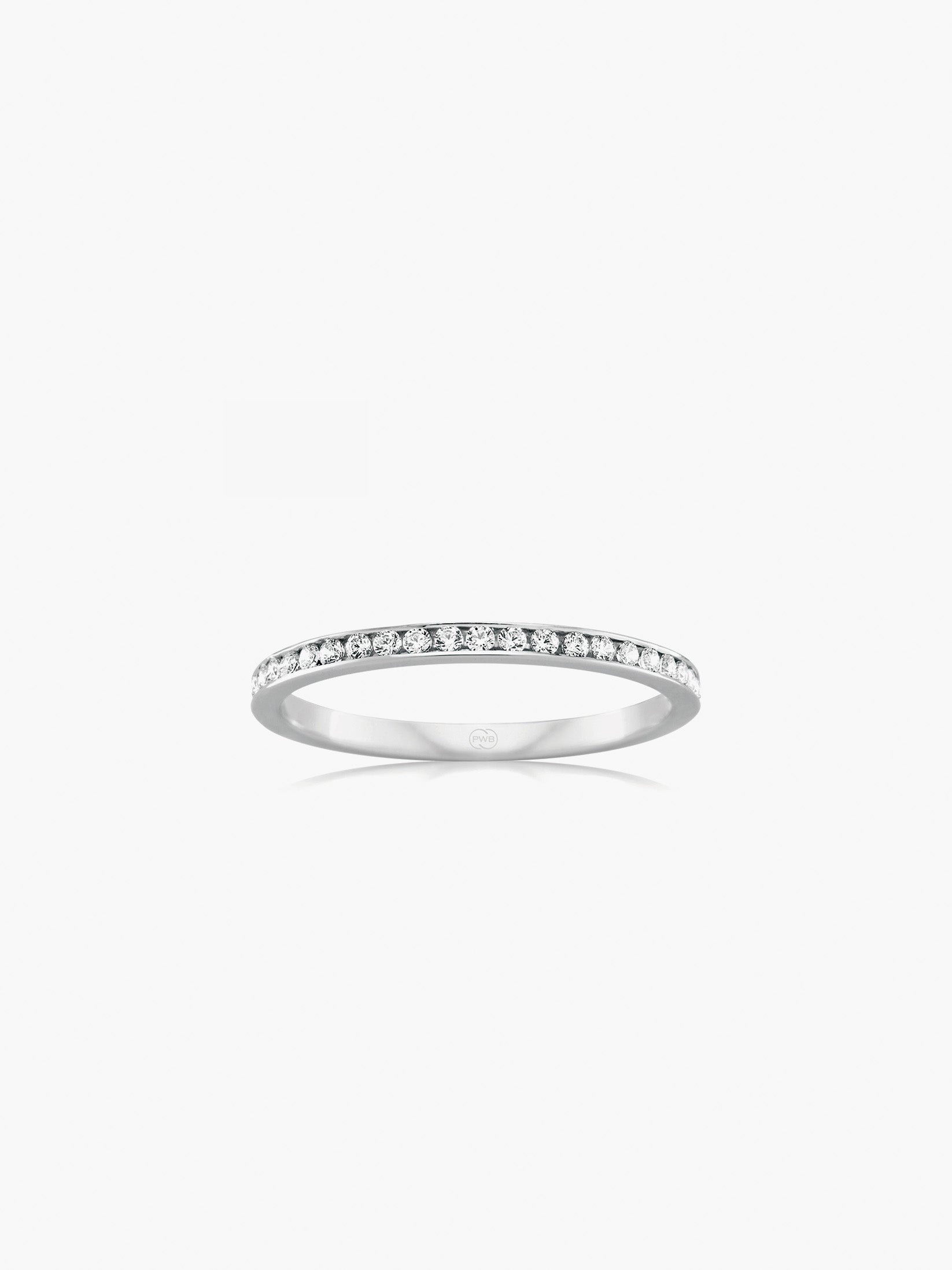 This Orsini channel set diamond wedding ring features 25 round brilliant cut diamonds totalling 0.25ct, set seamlessly into a polished white gold band.
