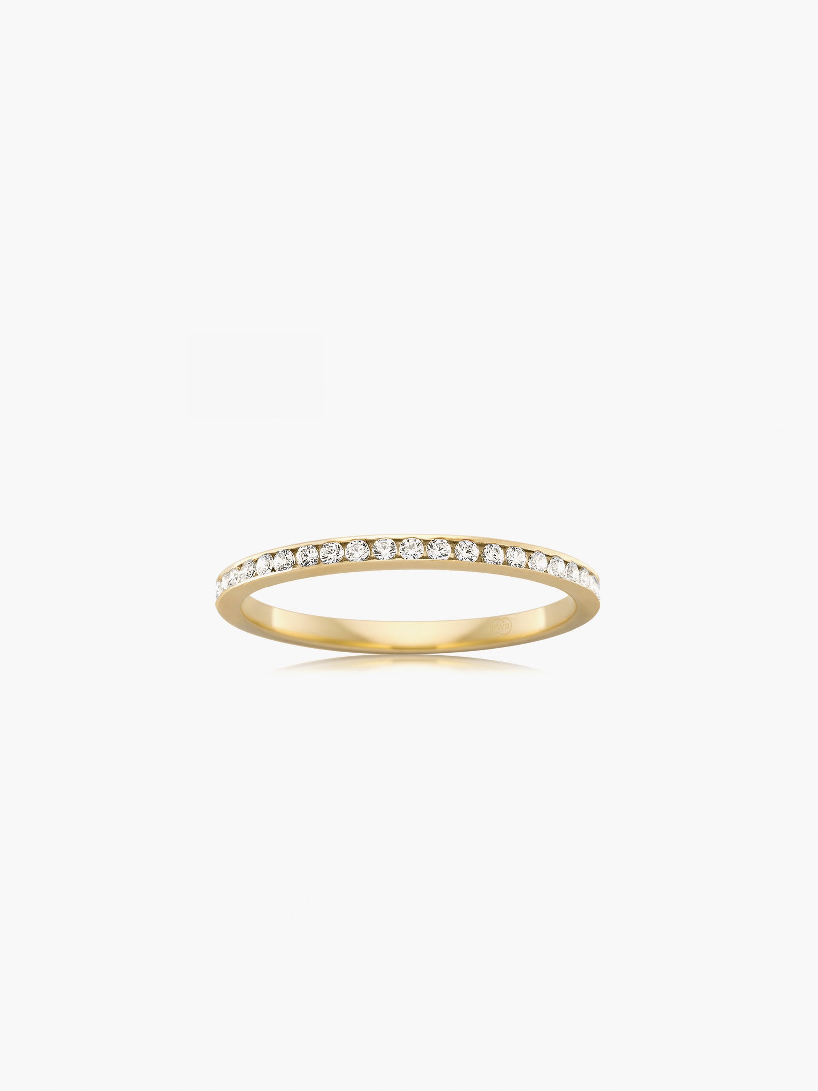 This Orsini channel set diamond wedding ring features 25 round brilliant cut diamonds totalling 0.25ct, set seamlessly into a refined yellow gold band.