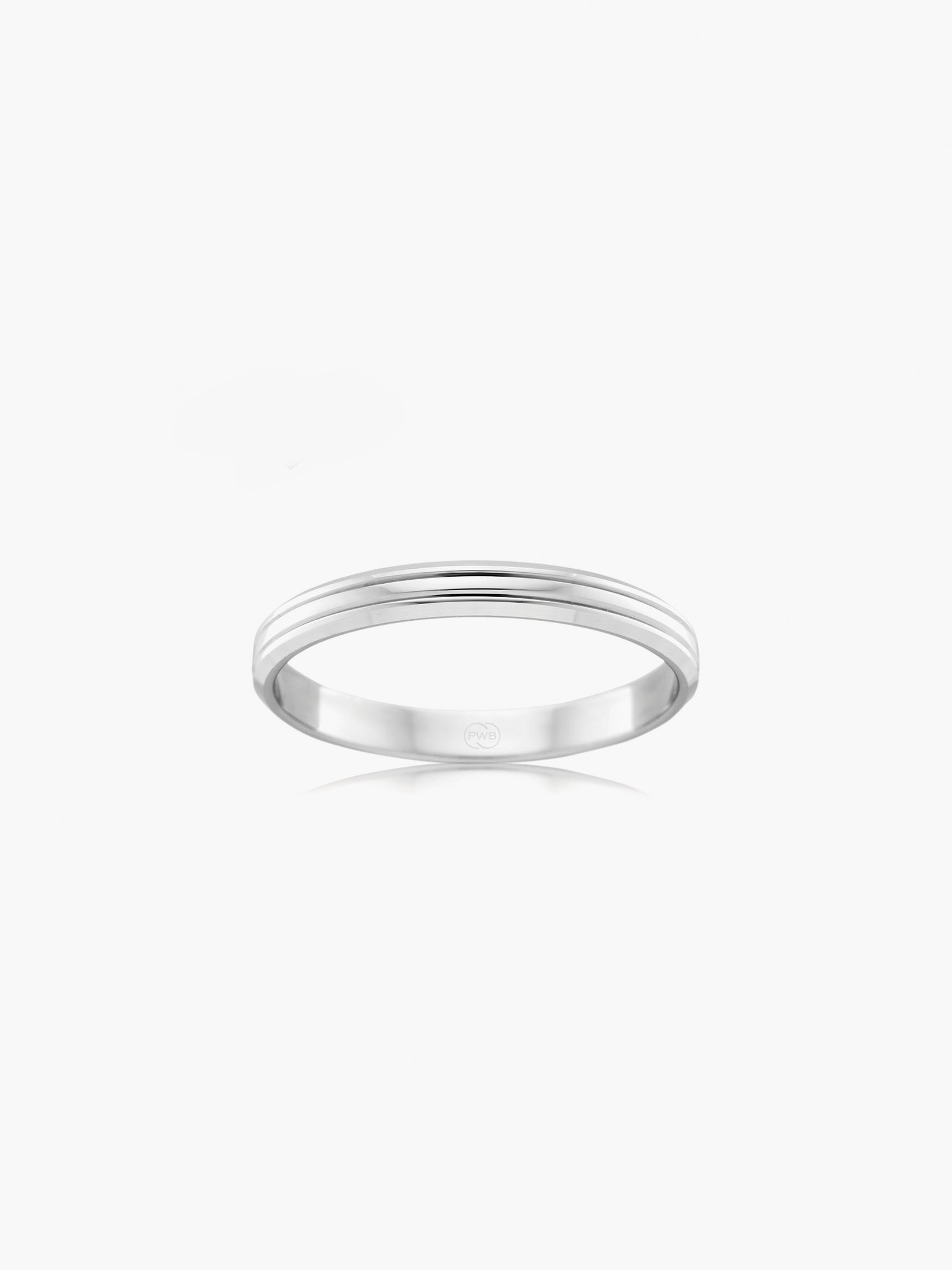 A refined white gold wedding ring featuring clean dual groove detailing for a subtle architectural finish. 