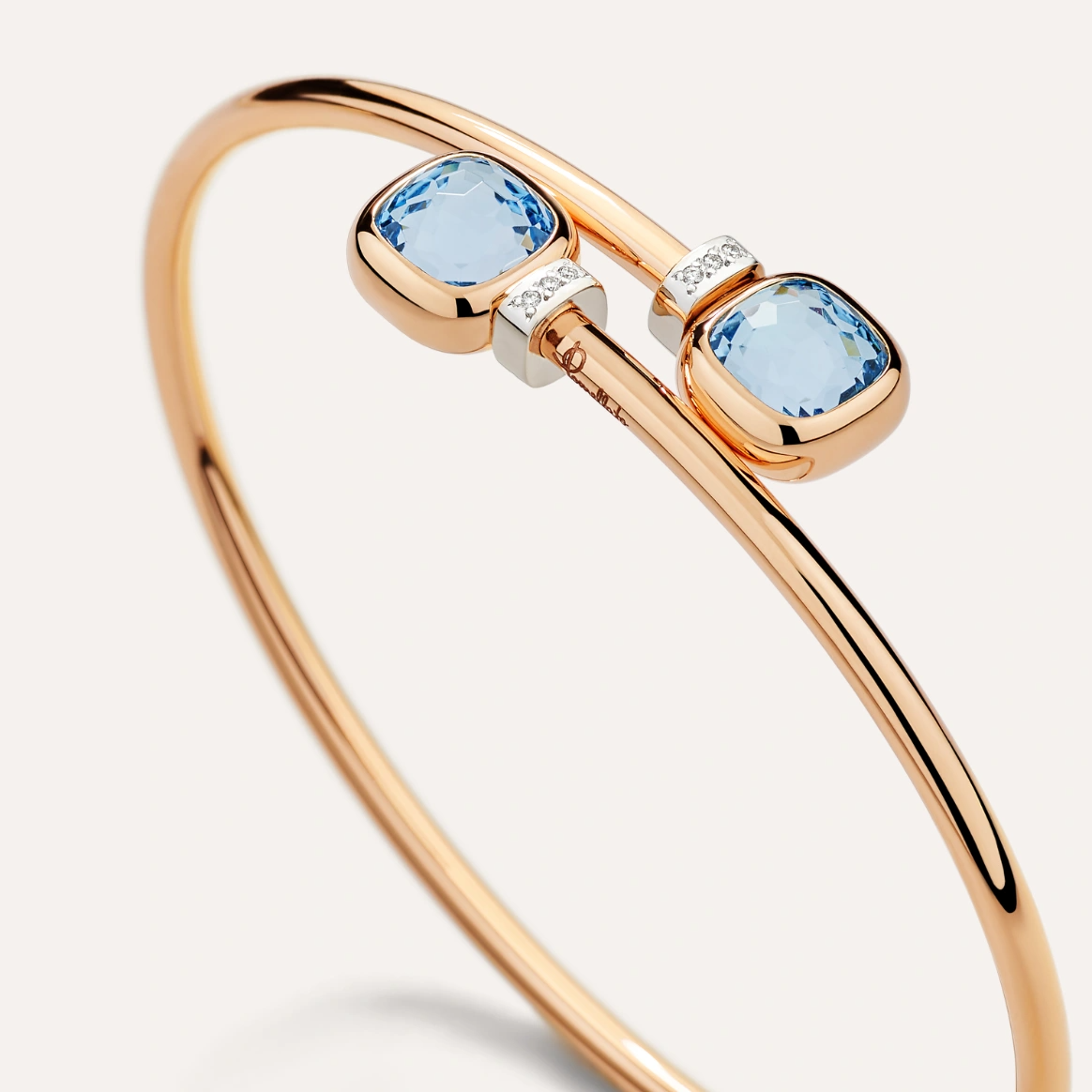 Pomellato nudo mini bangle bracelet with sky blue topaz gemstones italian jewellery designer with diamonds