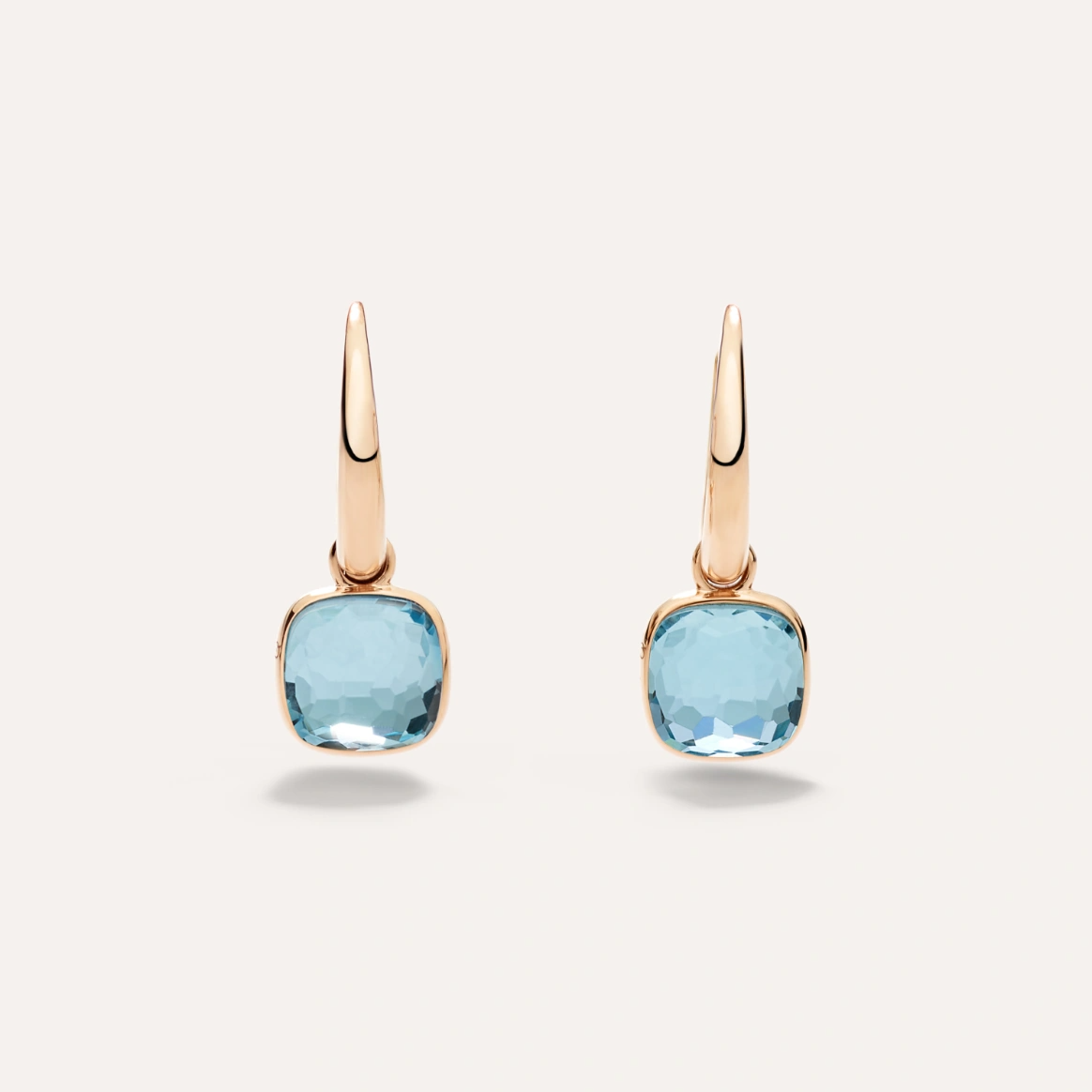 Nudo Mini Earrings
Sky blue topaz gemstones