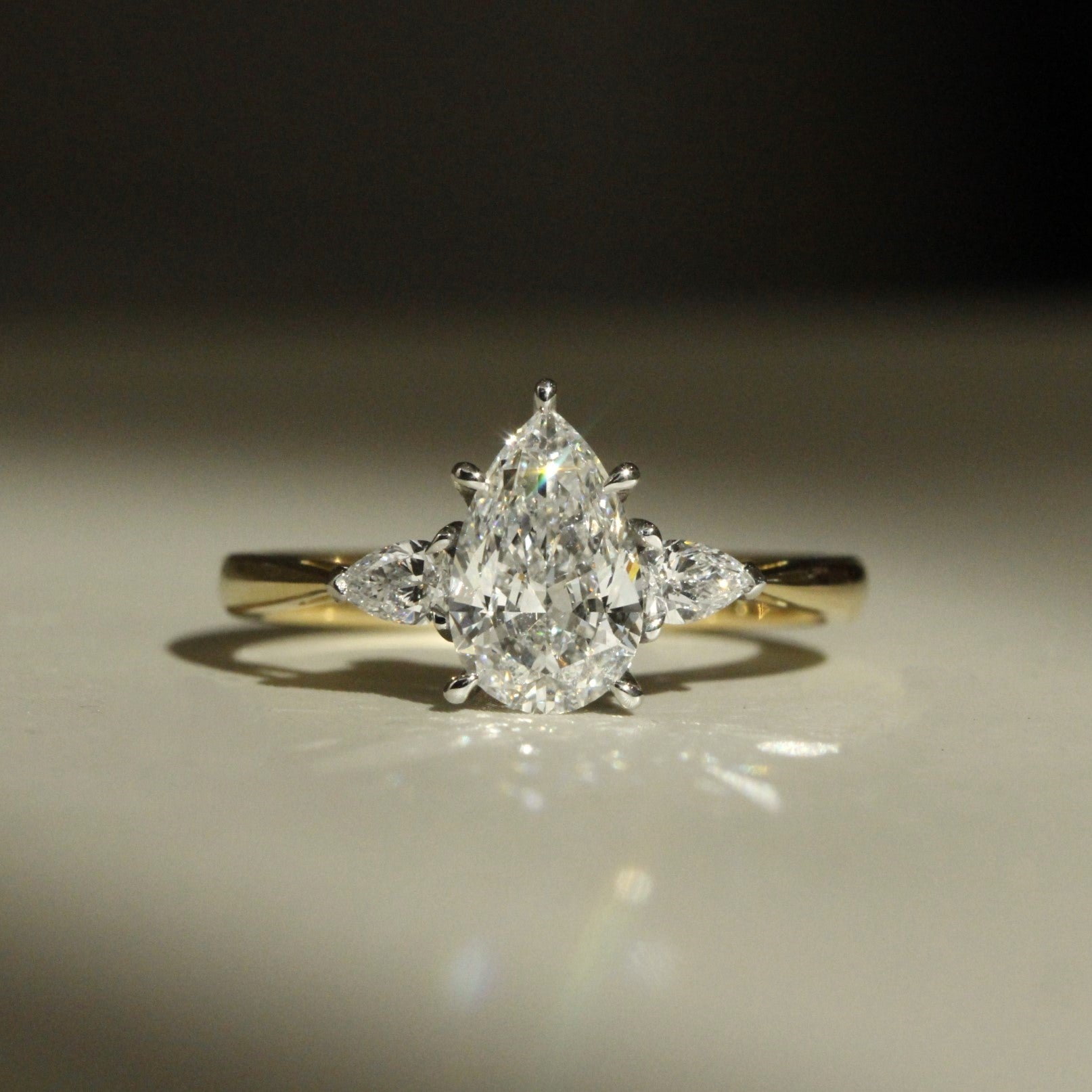 Resized_Three_Stone_Pear_Ring