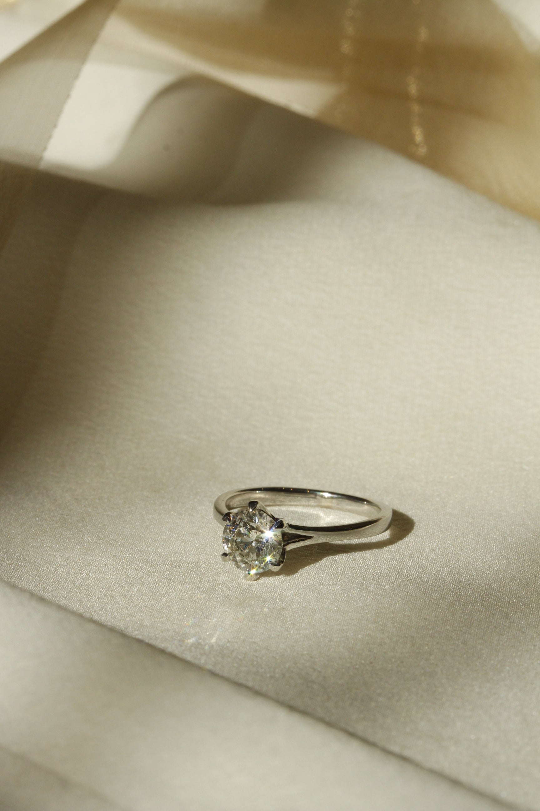 Solitaire Diamond Engagement Ring Set in Platinum with a 1.5 carat Diamond Ducale Setting 