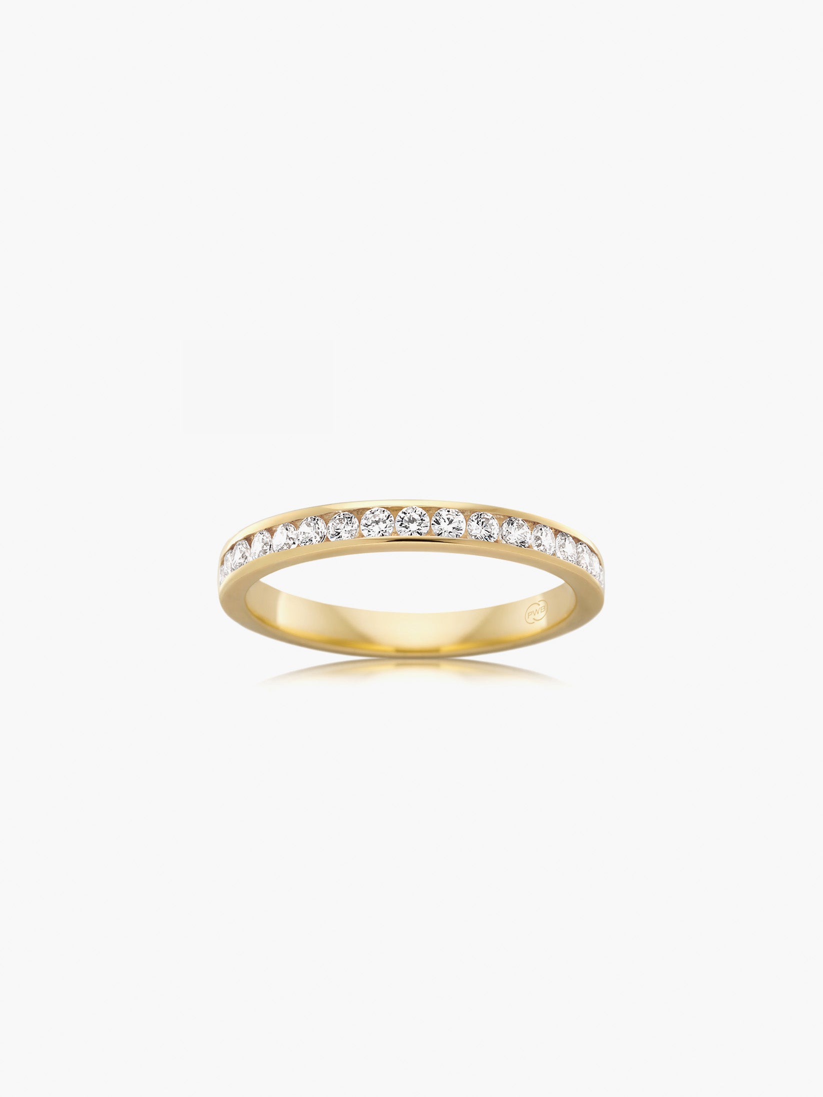 This slim wedding ring with channel set diamonds features a refined row of brilliant cut diamonds set seamlessly within the band. Each Orsini wedding ring is crafted to order, allowing you to personalise the design in your preferred metal, width, thickness, and finger size.