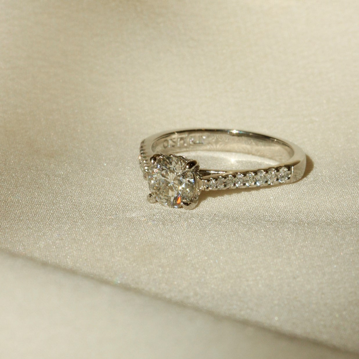 Engagement ring with gradual diamonds along band image cropped for square 