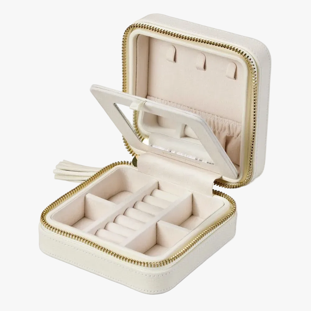 WOLF Lauren small zip jewellery case in ivory leather with elegant storage for rings, earrings, bracelets and necklaces.