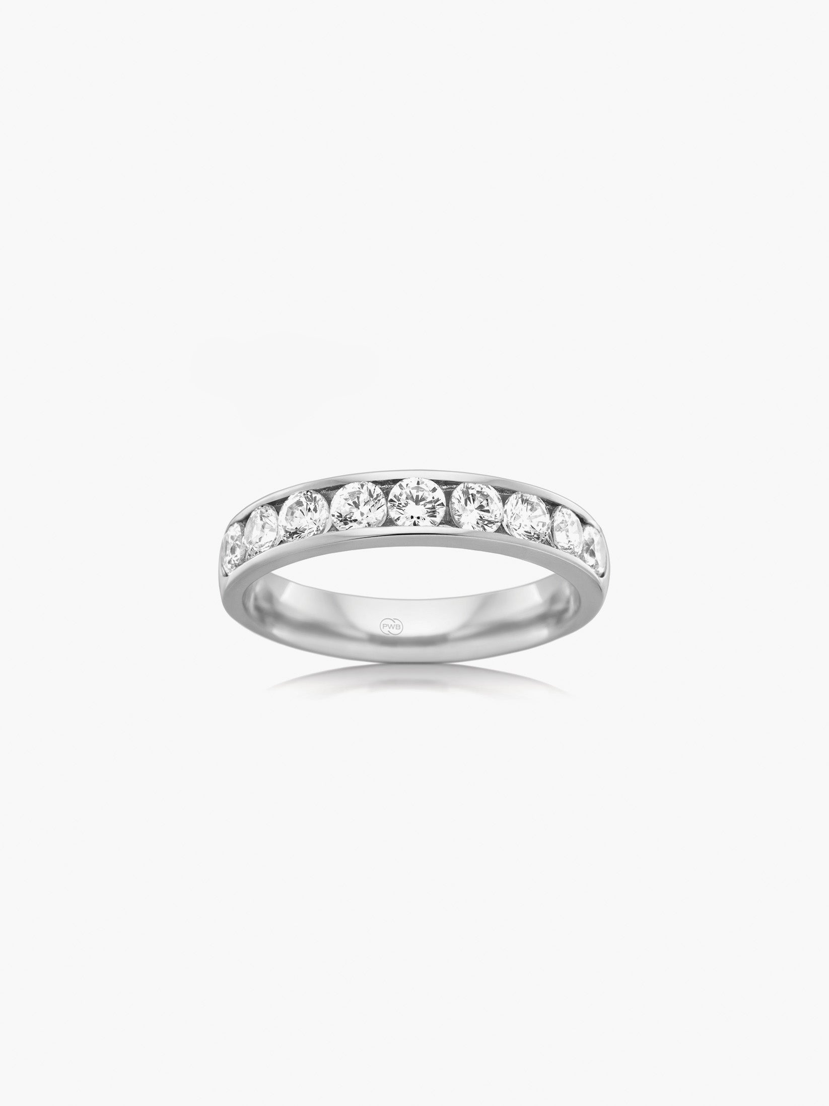 This wide diamond white gold wedding ring features a bold band profile set with brilliant cut diamonds for striking yet refined brilliance. Each Orsini wedding ring is crafted to order, allowing you to personalise the design in your preferred metal, width, thickness, and finger size.