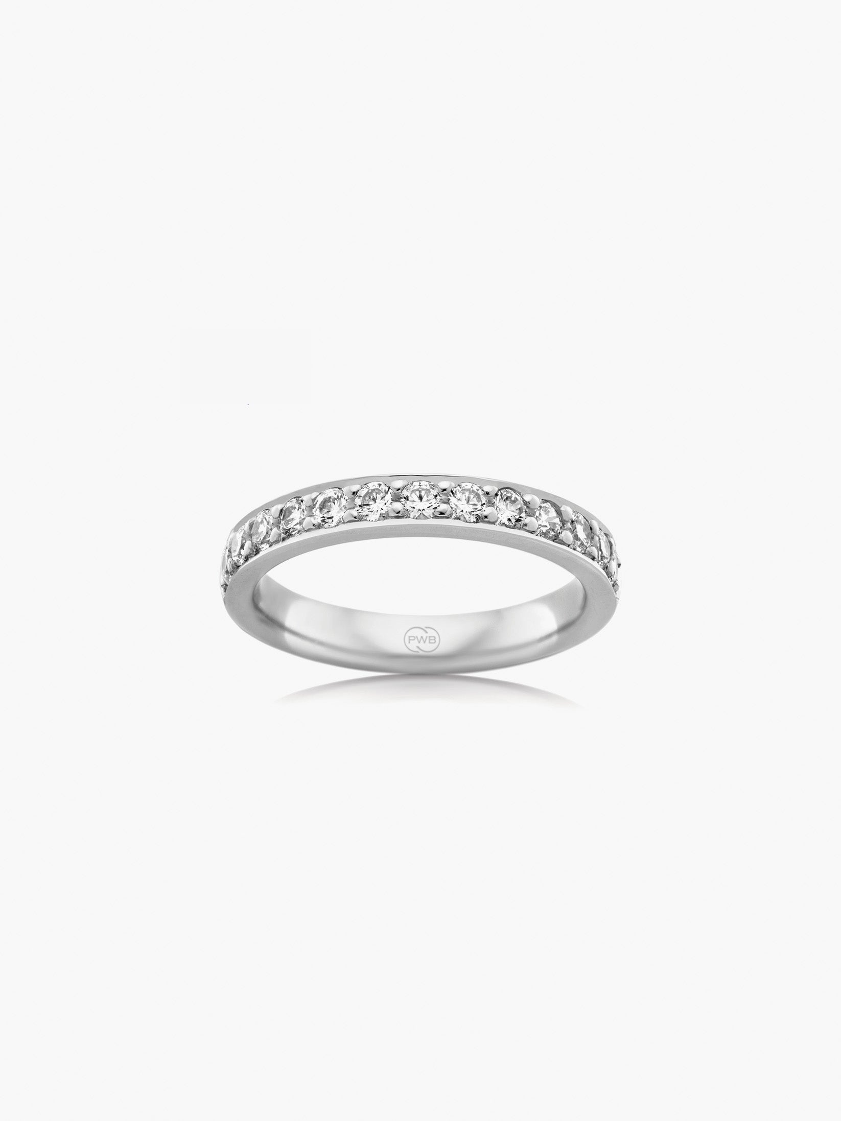 This white gold slim bead set diamond wedding ring features a refined row of brilliant cut diamonds set across a delicate band.