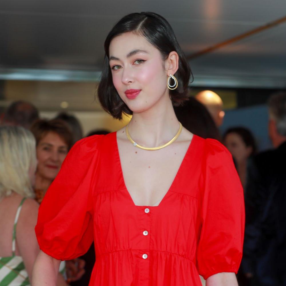 model wearing diamond and old necklace at Orsini yacht event