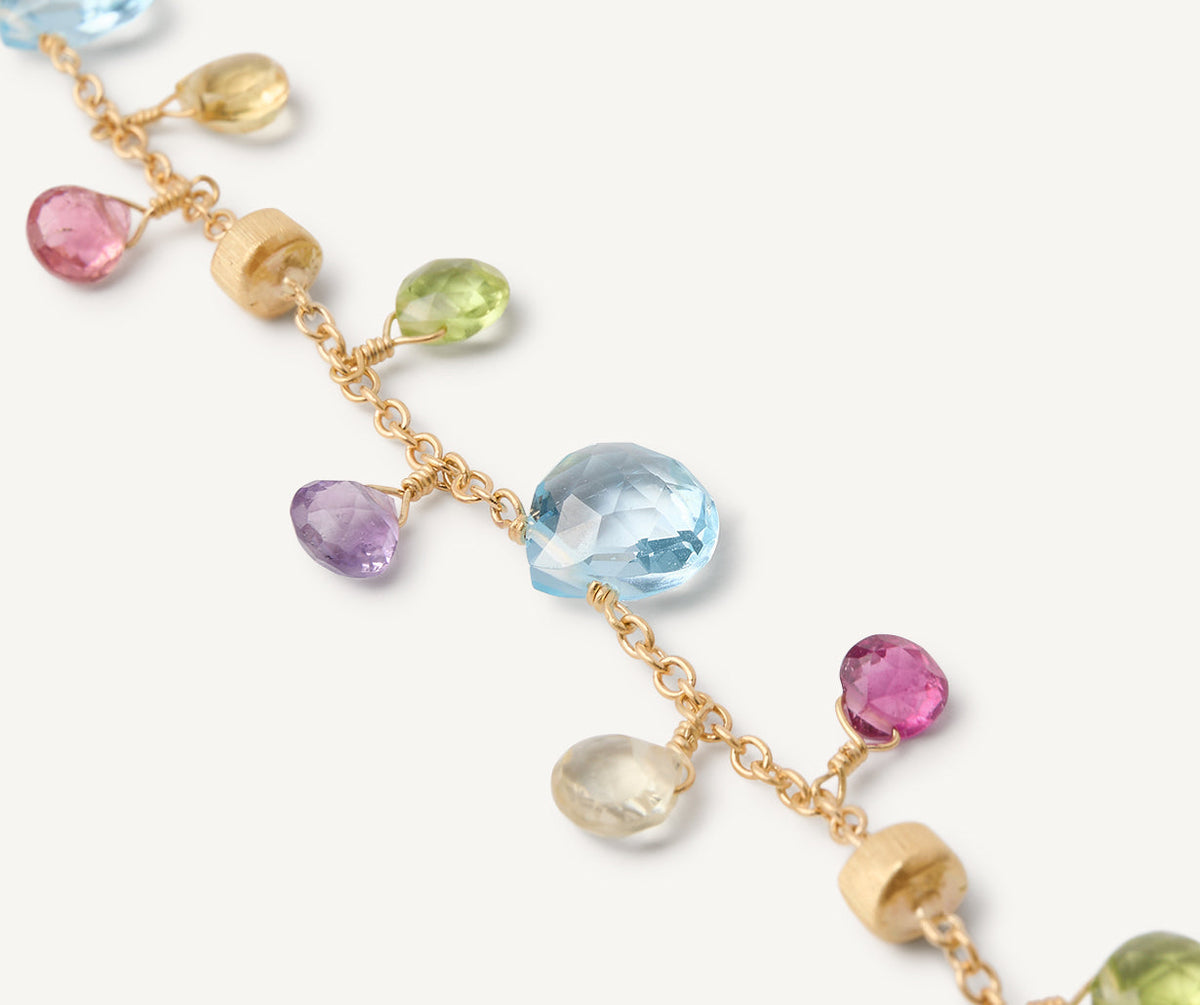 Blue topaz and mixed gemstones with 18k yellow gold Paradise bracelet by Marco Bicego