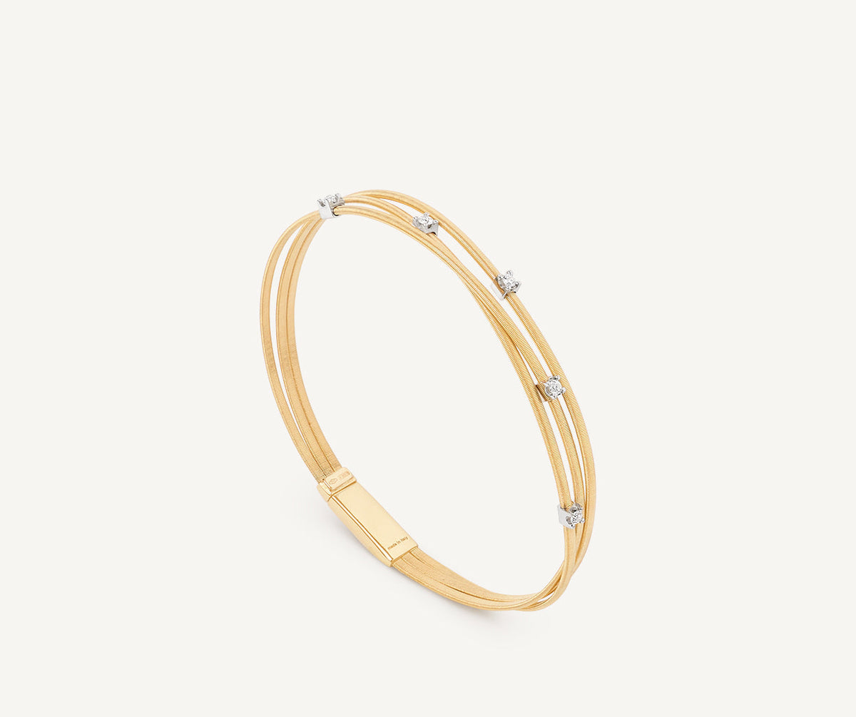 Yellow gold and diamonds three strand bracelet by Marco Bicego Marrakech collection
