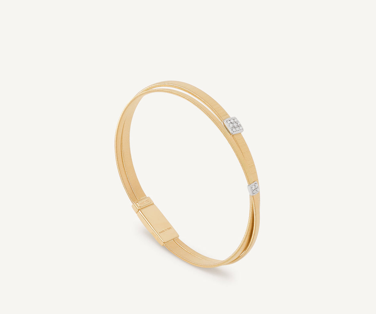 18k yellow gold with diamonds set in white gold Masai bracelet by Marco Bicego