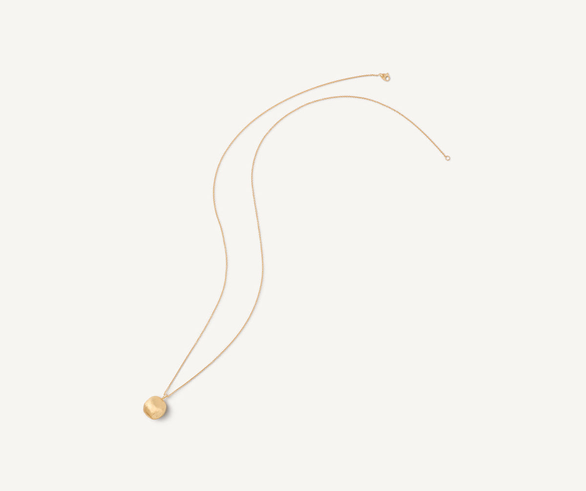 Long version of Africa ball necklace in 18k yellow gold with diamonds on white background