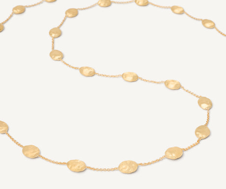 Close up of Siviglia yellow gold long necklace detail by Marco Bicego