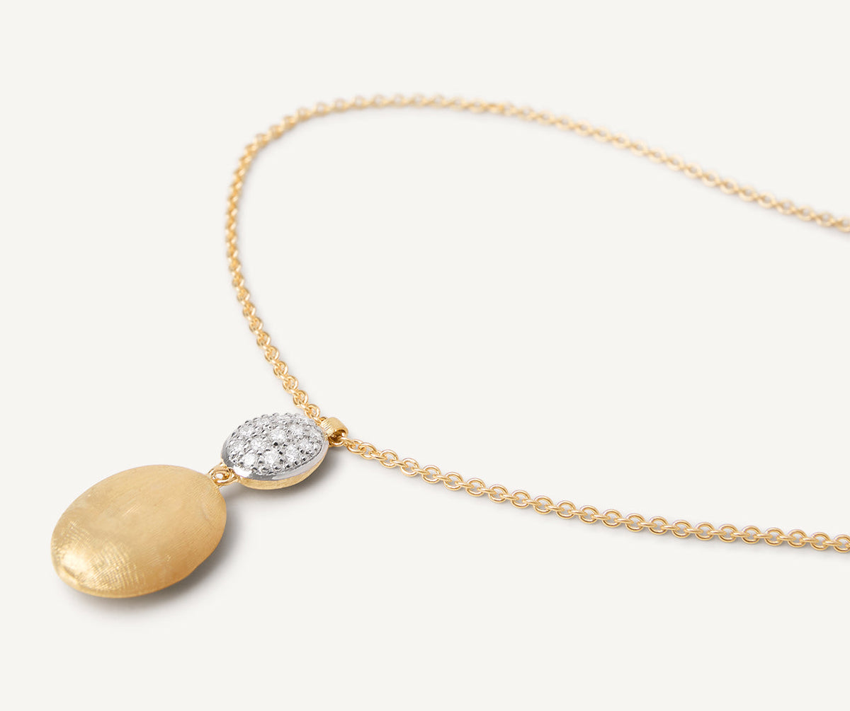 Diamonds set in white gold with yellow gold drop Siviglia necklace image with white background by Marco Bicego