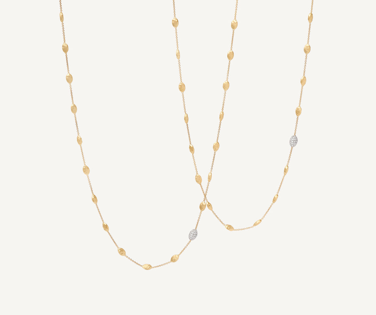 Long yellow gold and white gold with diamonds SIviglia necklace by Marco Bicego