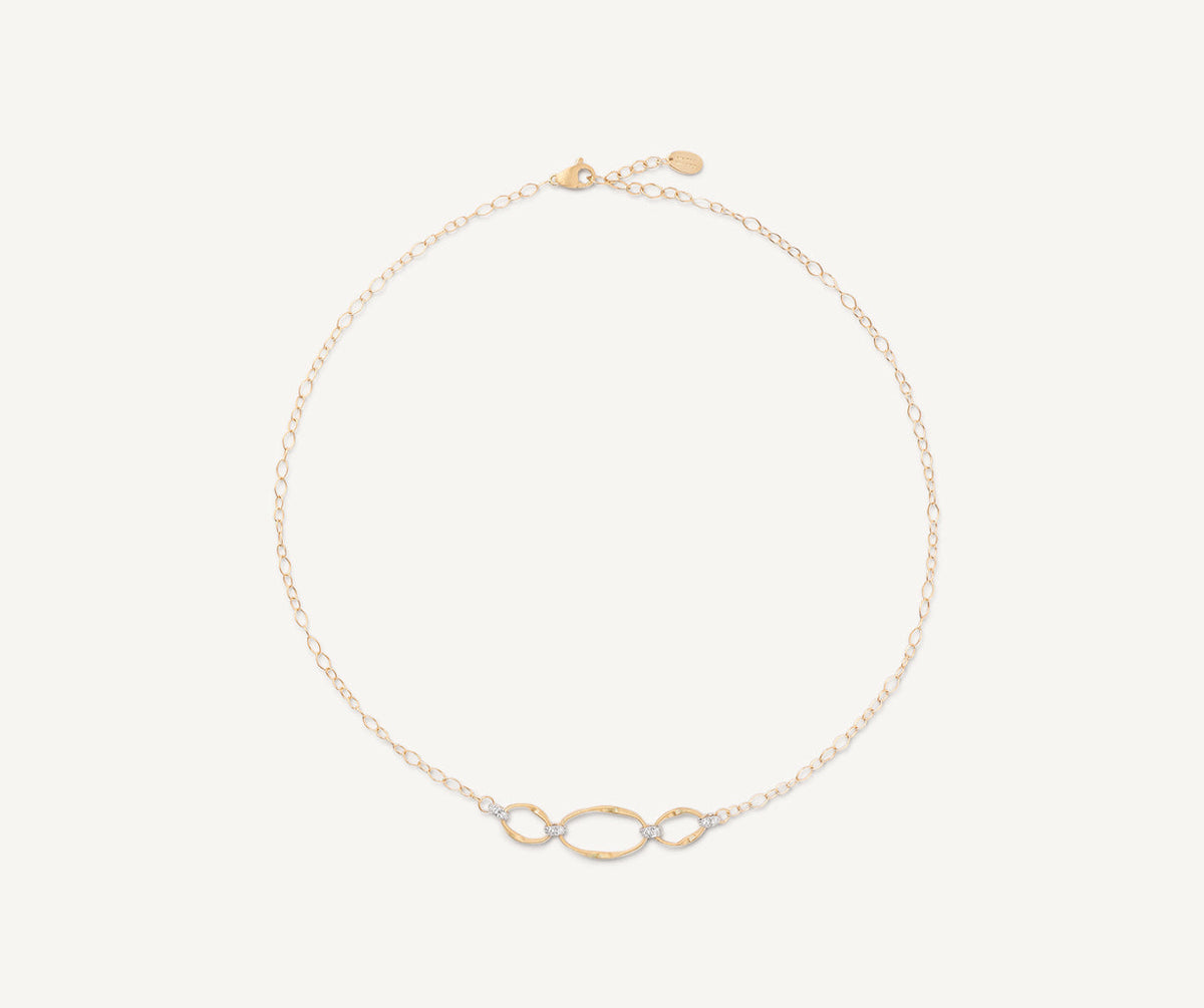 Marrakech Onde necklace in 18k yellow gold with diamonds on white background by Marco Bicego